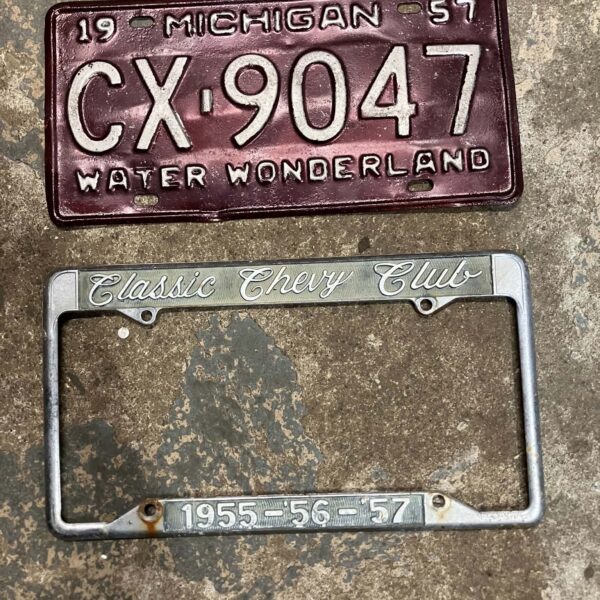 1957 Michigan state license plate, water wonderland, and chevy frame, used