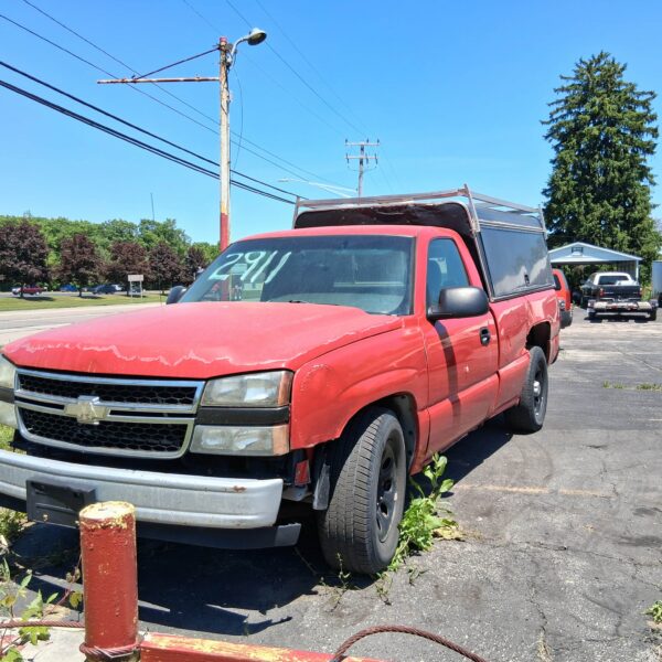 2007 Chevy Silverado pickup, red, 2wd, brakes and lines done last year, AC cold, body has rust, motor great, with utility box #1419