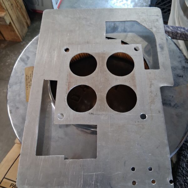 Carb spacer/heat shield for bottom of dominator, used